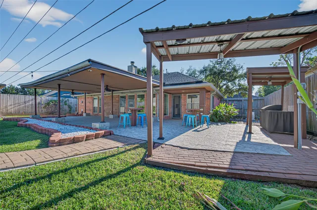 a view of a house with a swimming pool