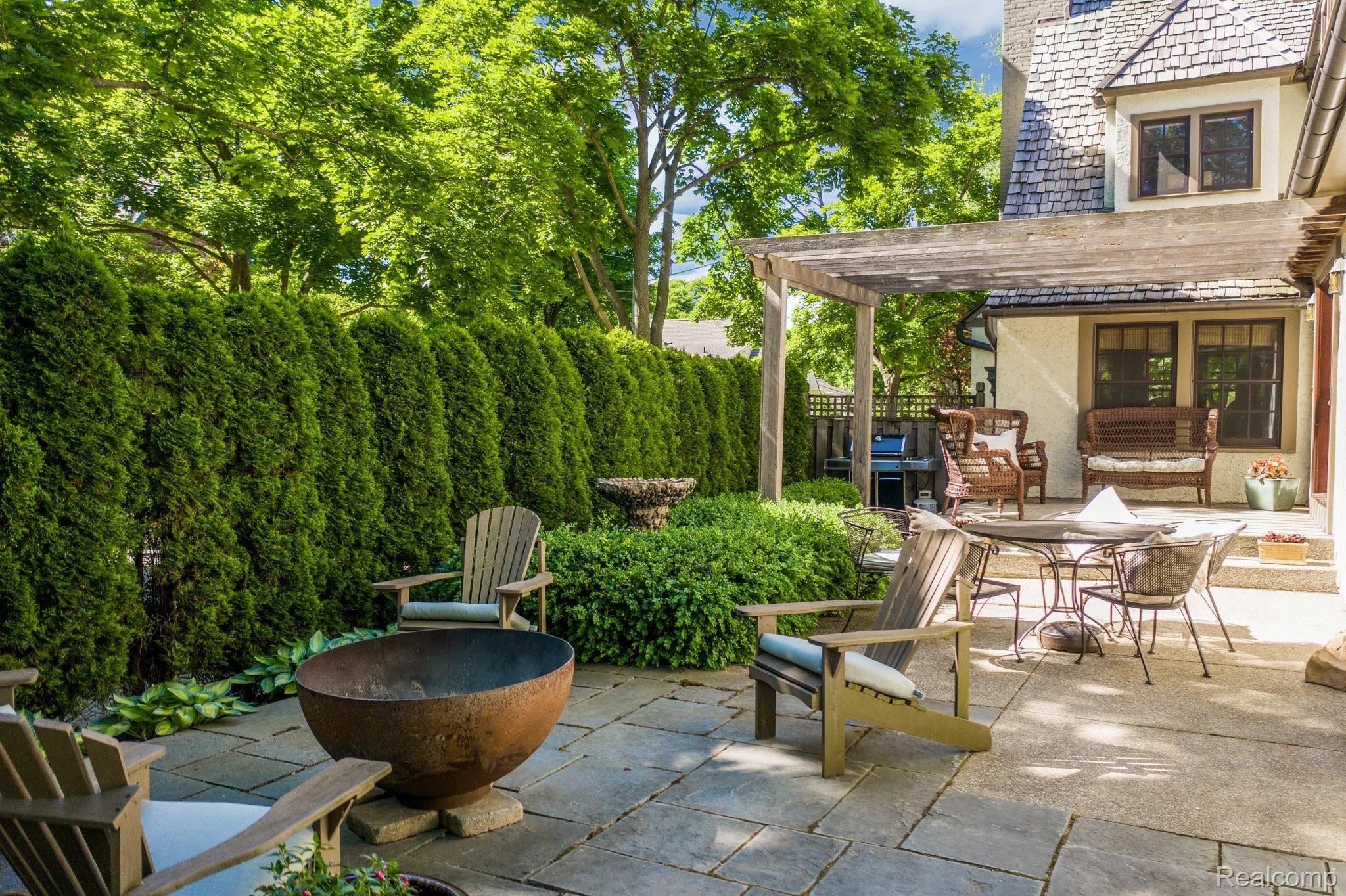 512 Rivenoak Street Birmingham, MI 48009 - Photo 40 of 47 Stunning back yard with aggregate concrete patio.