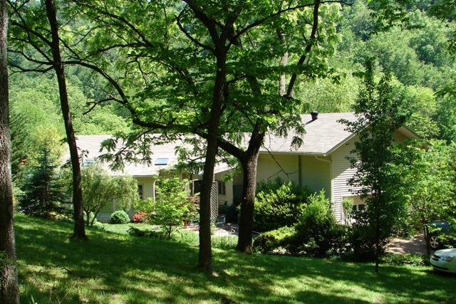 6750 Lane Road College Grove, TN 37046 - Photo 1 of 14 view of front of home and garden
