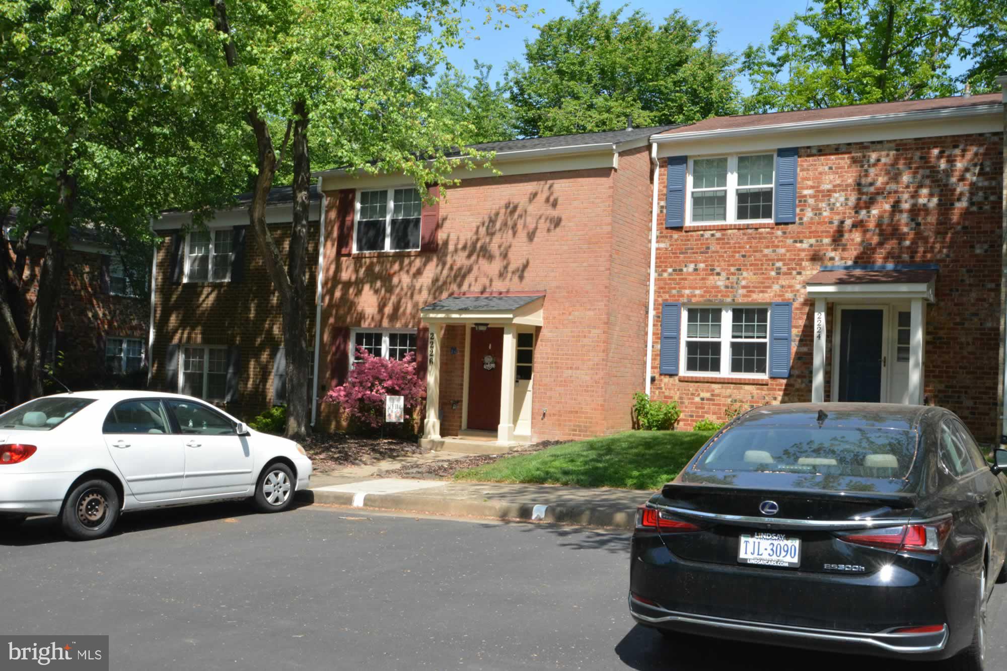 2226 Gunsmith Square Reston, VA 20191 - Photo 2 of 35 a view of a car parked in front of a house