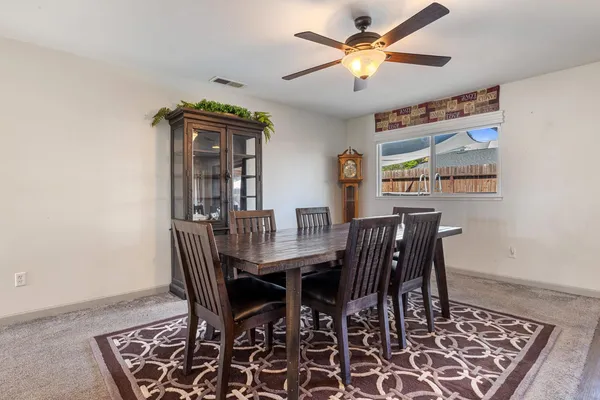 a view of a dining room with furniture