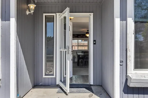 a view of front door and bedroom