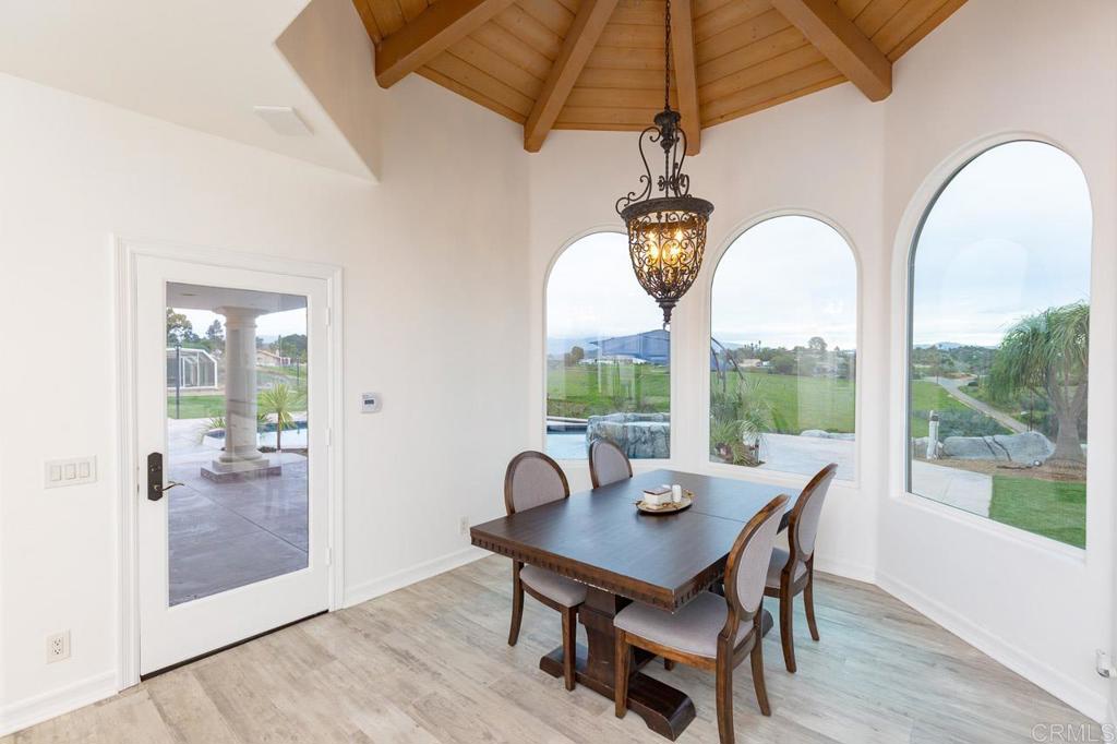 9650 Covey Lane Escondido, CA 92026 - Photo 23 of 39 a view of a dining room with furniture window and outside view