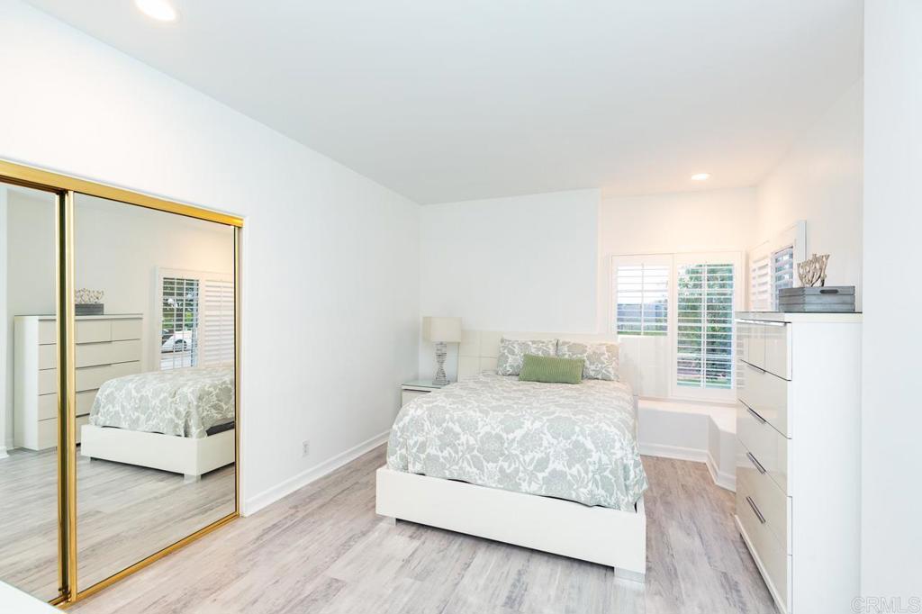 9650 Covey Lane Escondido, CA 92026 - Photo 30 of 39 a bedroom with a bed and large window