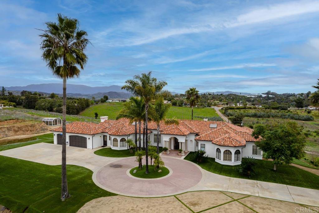 9650 Covey Lane Escondido, CA 92026 - Photo 3 of 39 an aerial view of residential houses with outdoor space and trees