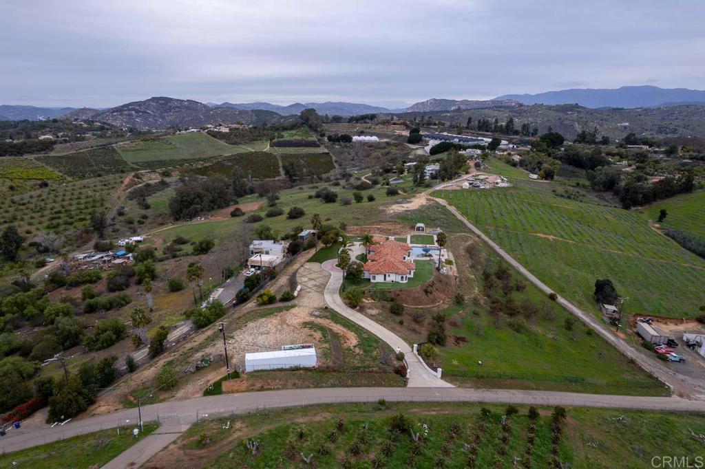 9650 Covey Lane Escondido, CA 92026 - Photo 39 of 39 an aerial view of residential houses with outdoor space and river