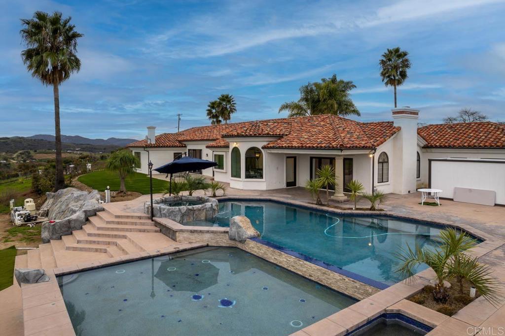 9650 Covey Lane Escondido, CA 92026 - Photo 6 of 39 a view of a house with pool and chairs