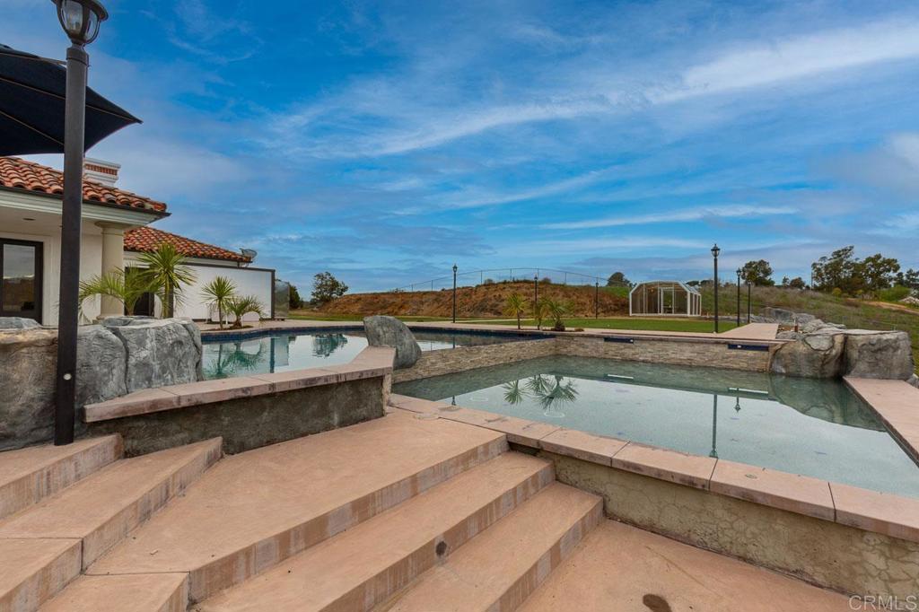 9650 Covey Lane Escondido, CA 92026 - Photo 8 of 39 a view of a balcony with chairs