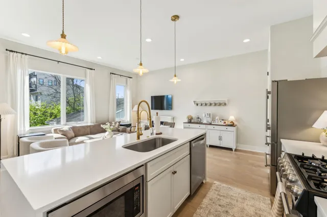 a bedroom with a bed and a table