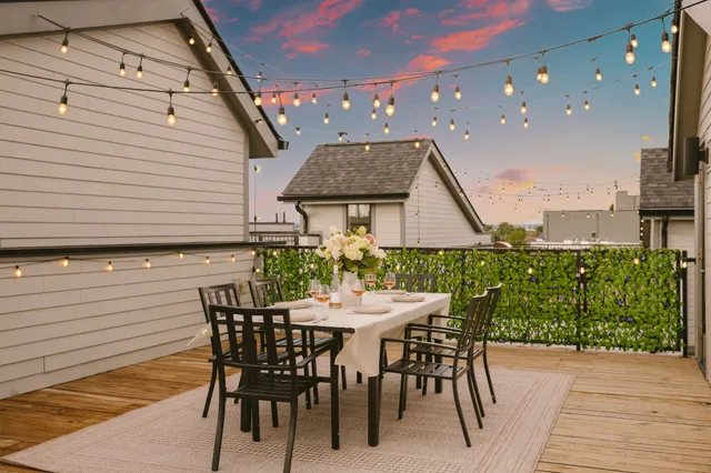 a bathroom with double vanity sink and a mirror