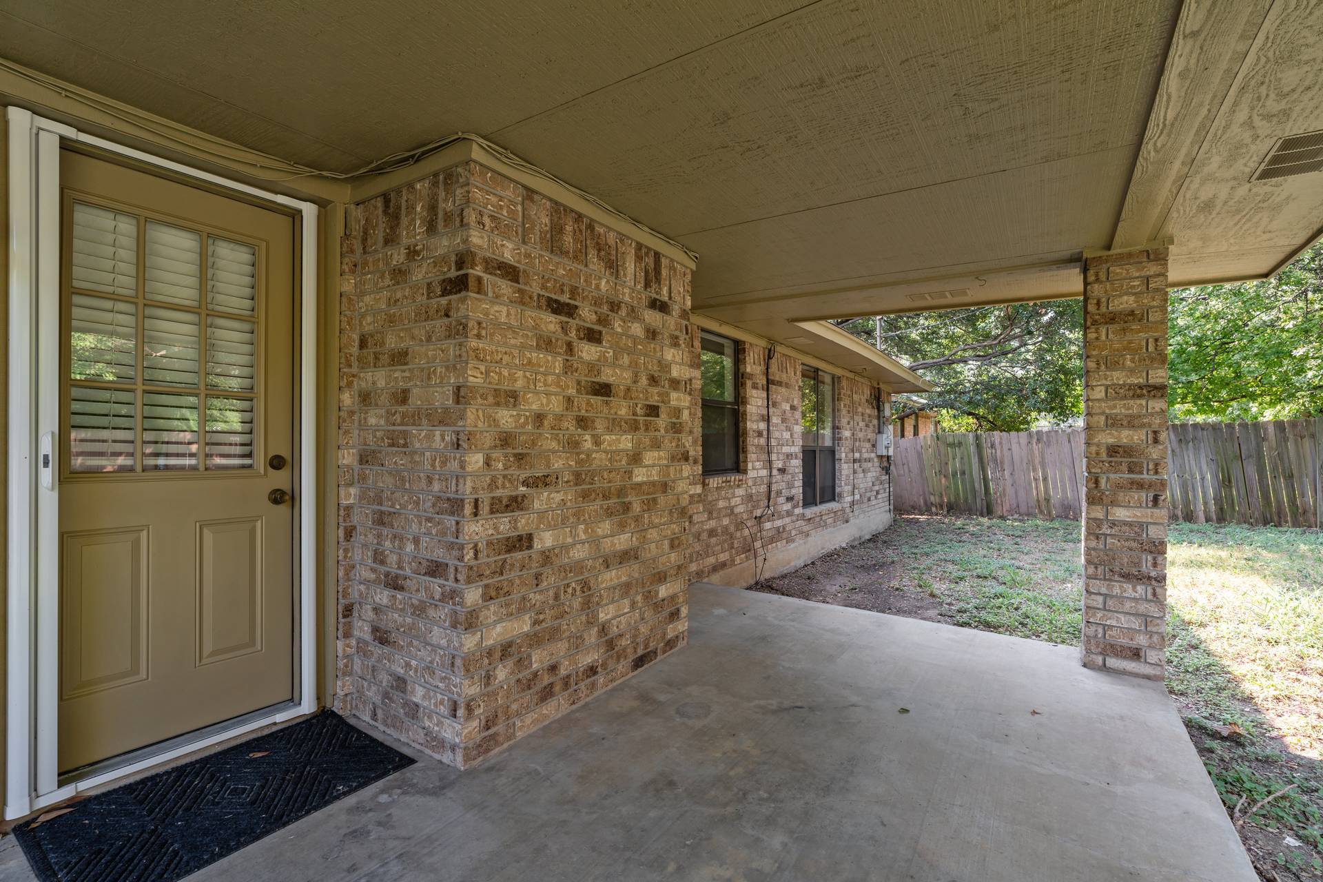 1802 Dixie Lane Round Rock, TX 78664 - Photo 11 of 30 a view of a house with backyard and porch