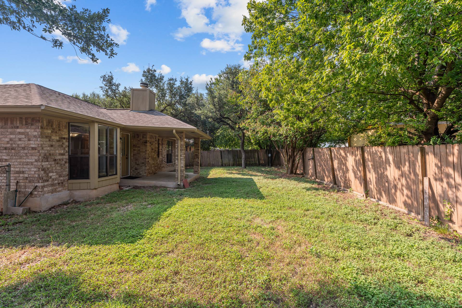 1802 Dixie Lane Round Rock, TX 78664 - Photo 12 of 30 a view of a house with backyard and sitting area
