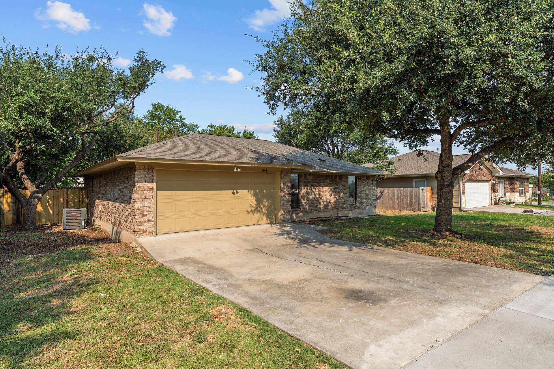 1802 Dixie Lane Round Rock, TX 78664 - Photo 13 of 30 a view of a house with a yard and large tree