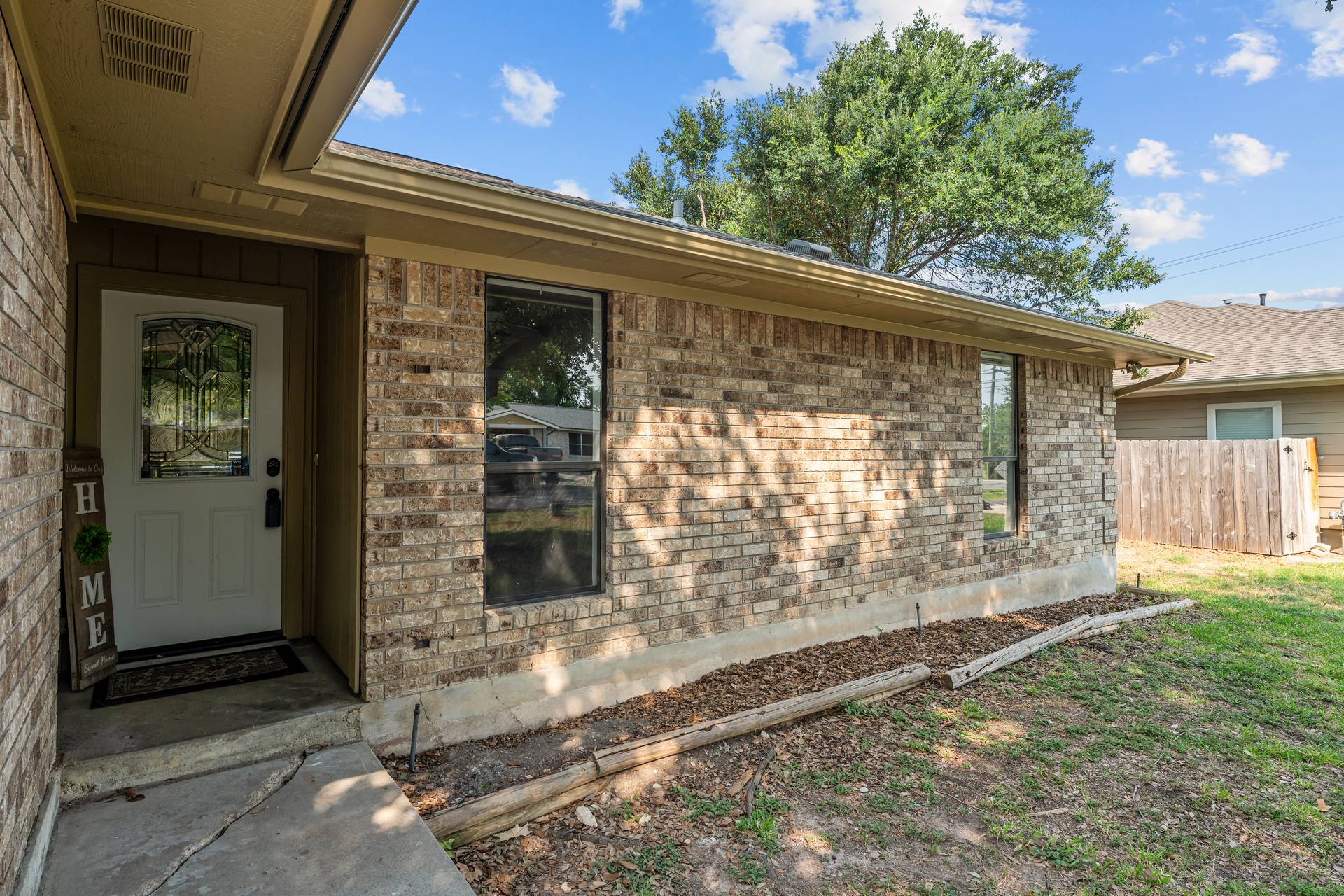 1802 Dixie Lane Round Rock, TX 78664 - Photo 15 of 30 a front view of a house with a yard