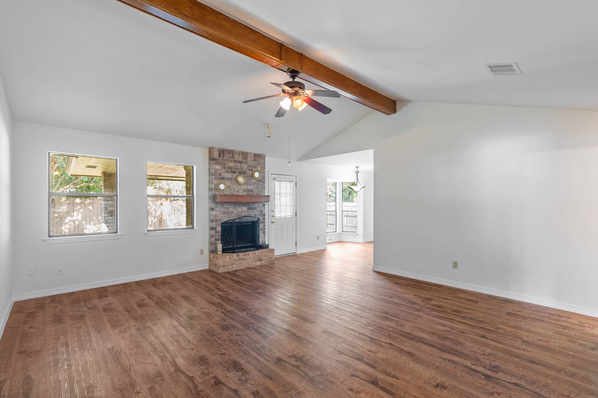 1802 Dixie Lane Round Rock, TX 78664 - Photo 19 of 30 a view of empty room with wooden floor and fan