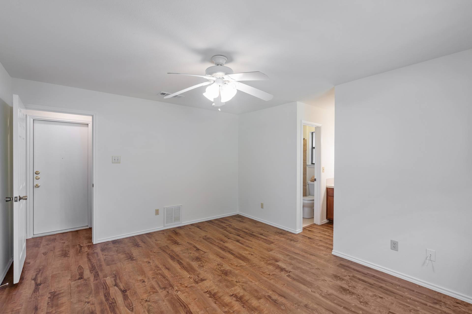 1802 Dixie Lane Round Rock, TX 78664 - Photo 20 of 30 wooden floor in an empty room