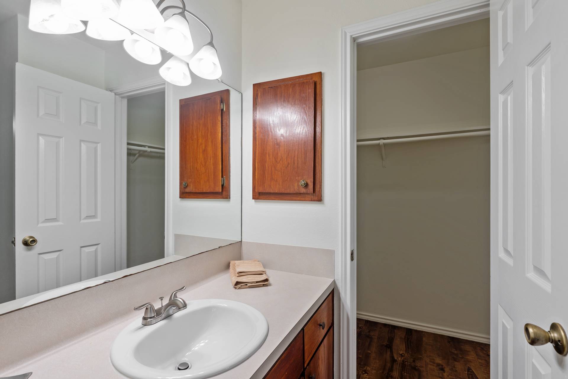 1802 Dixie Lane Round Rock, TX 78664 - Photo 23 of 30 a bathroom with a sink and a mirror