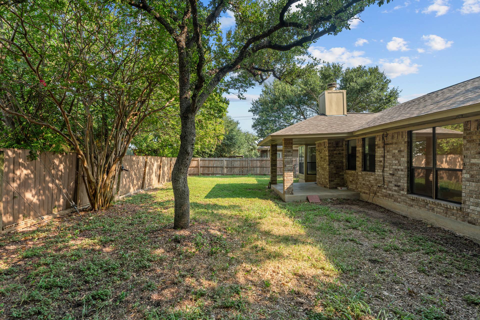 1802 Dixie Lane Round Rock, TX 78664 - Photo 30 of 30 a view of a house with backyard and sitting area