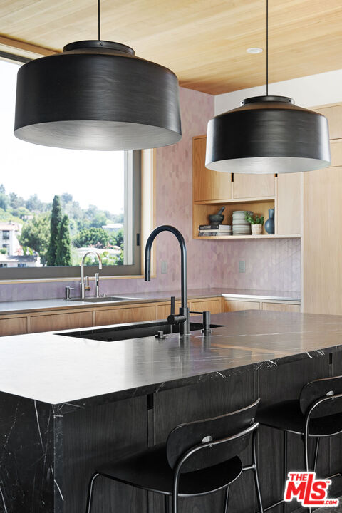 2634 Silver Ridge Avenue Los Angeles, CA 90039 - Photo 12 of 44 a kitchen with a sink and a stove