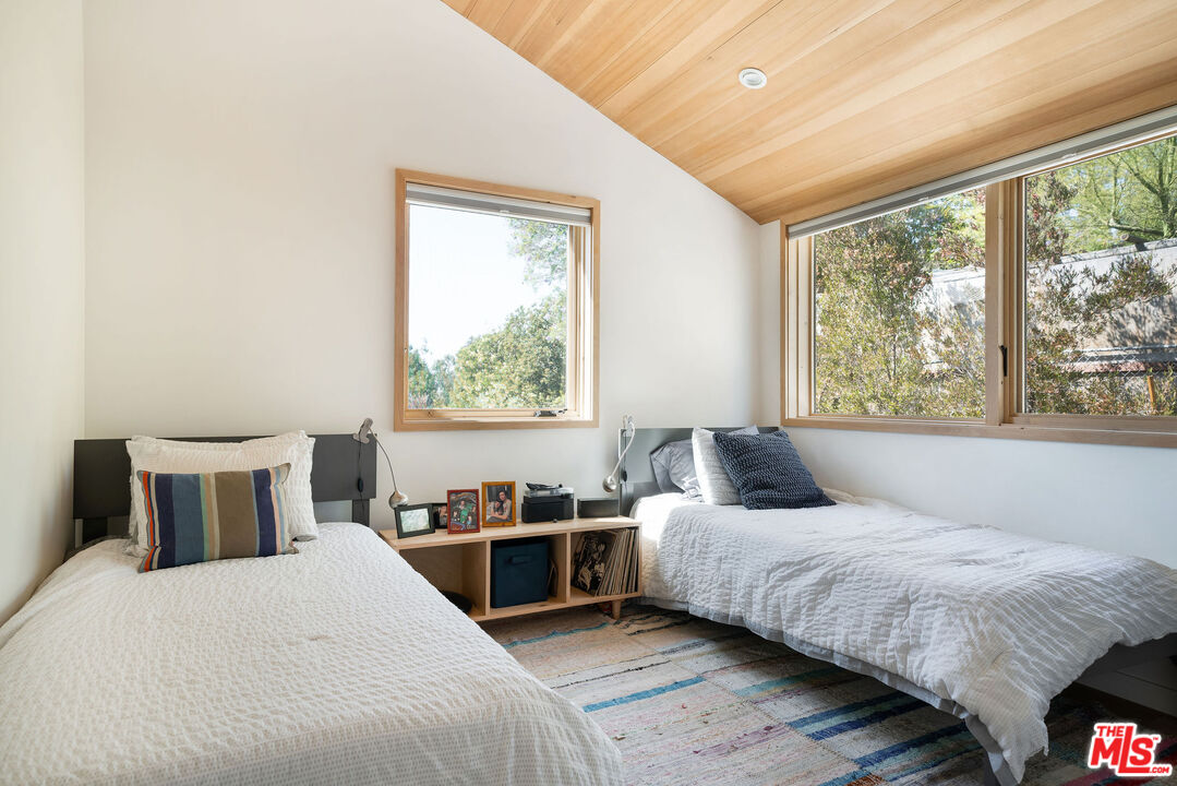2634 Silver Ridge Avenue Los Angeles, CA 90039 - Photo 33 of 44 a bedroom with a bed and a window