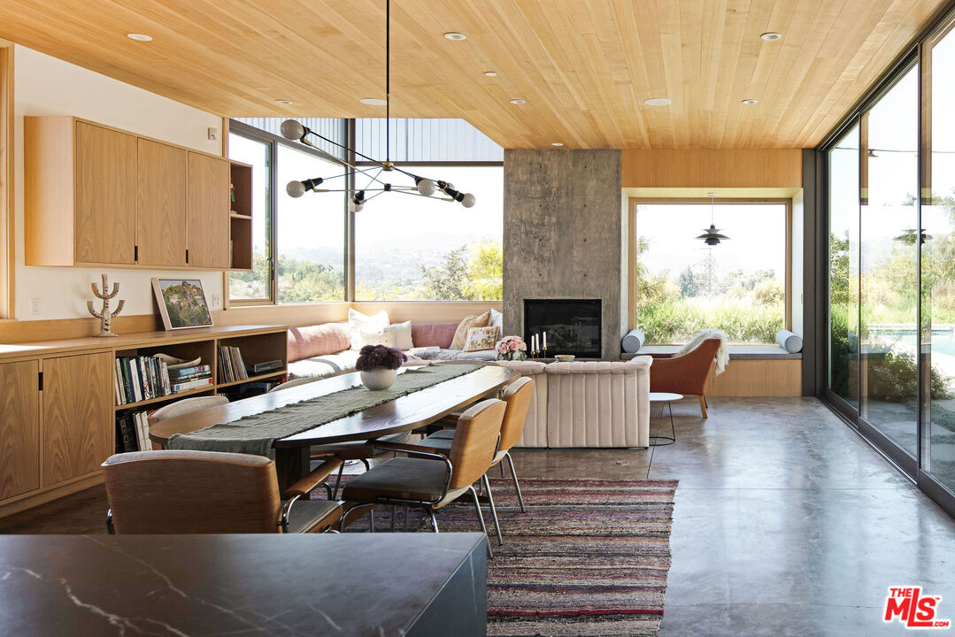 2634 Silver Ridge Avenue Los Angeles, CA 90039 - Photo 6 of 44 a living room with furniture and a large window