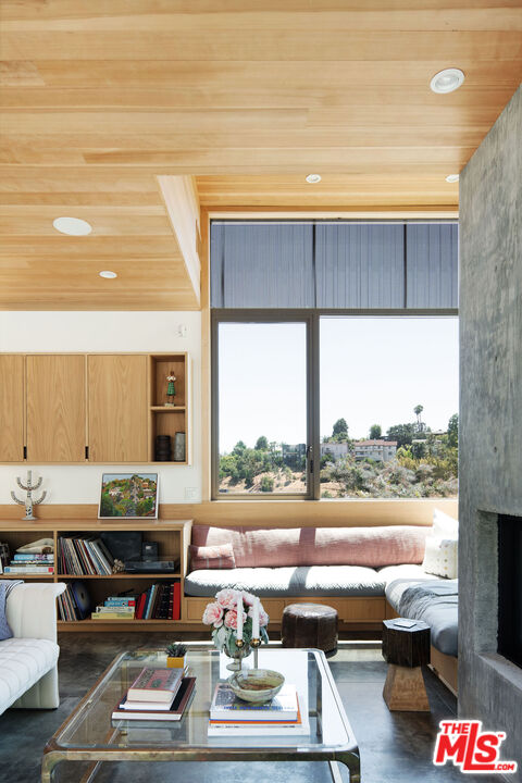 2634 Silver Ridge Avenue Los Angeles, CA 90039 - Photo 7 of 44 a living room with furniture and a floor to ceiling window