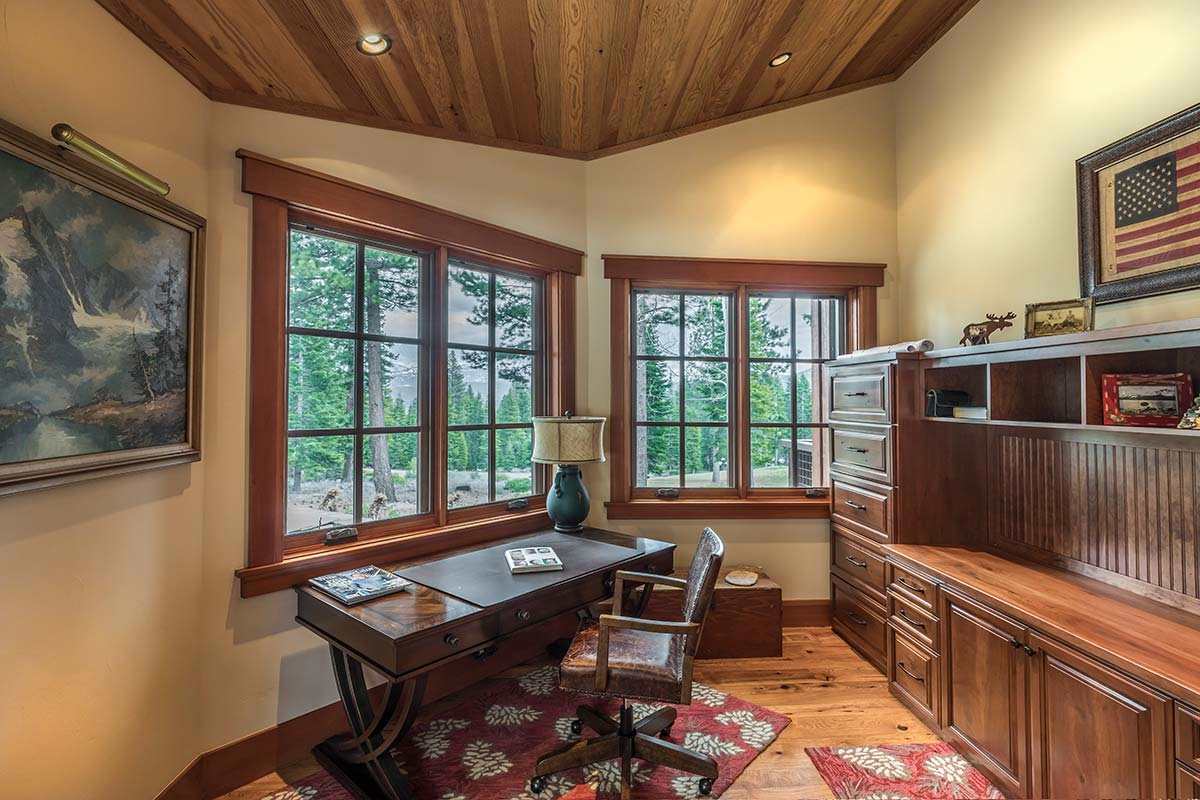 8336 Valhalla Drive Truckee, CA 96161 - Photo 21 of 21 a living room with furniture a window and a flat screen tv