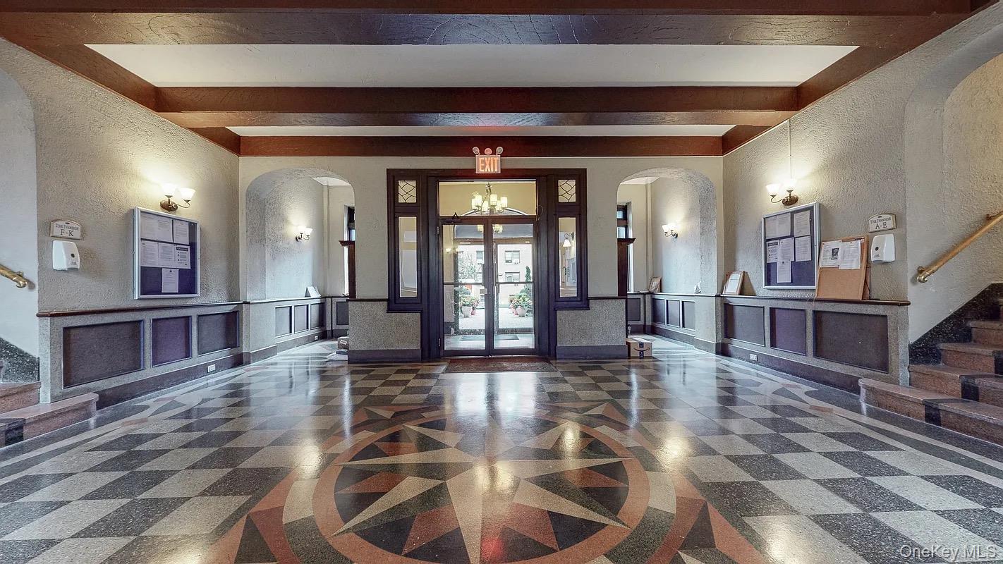 8384 116th Street, Unit 5G Queens, NY 11418 - Photo 2 of 17 a lobby with furniture and a rug