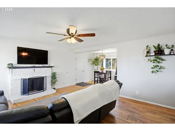 a bedroom with a bed and a fireplace