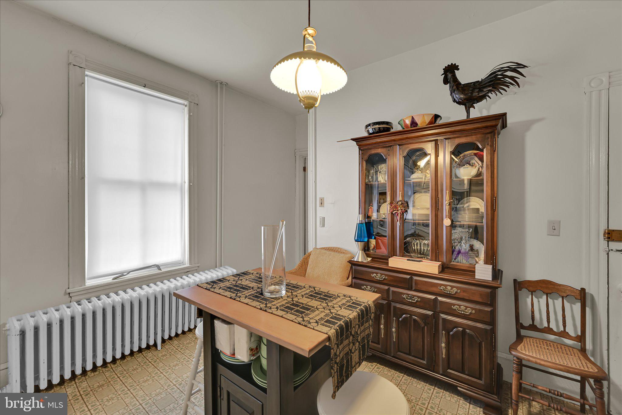 529 Windsor Street Reading, PA 19601 - Photo 14 of 36 a view of a dining room with furniture window and wooden floor