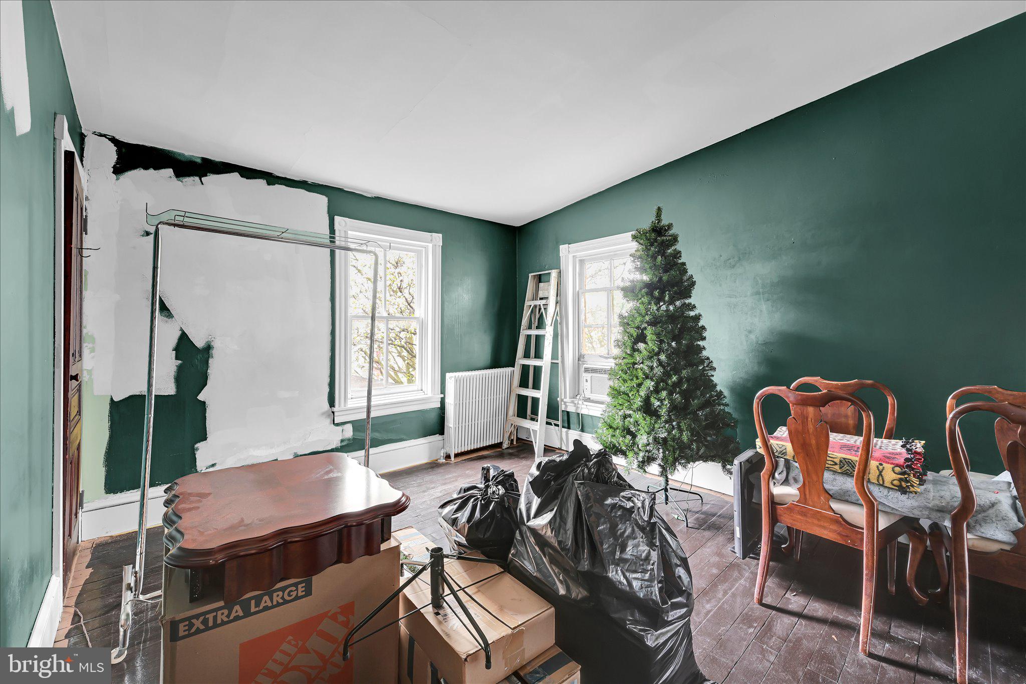 529 Windsor Street Reading, PA 19601 - Photo 21 of 36 a living room with furniture and a large window