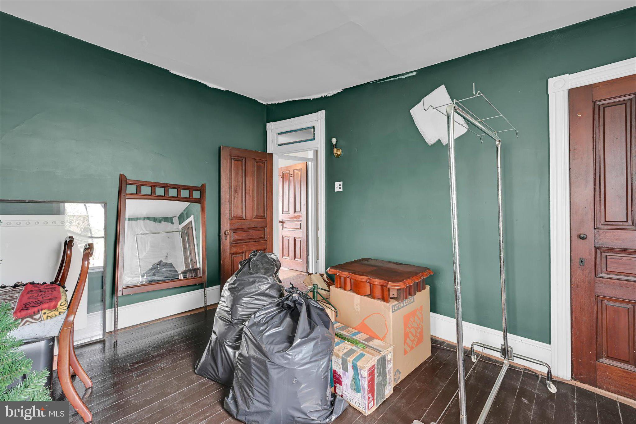 529 Windsor Street Reading, PA 19601 - Photo 22 of 36 a bedroom with furniture and a window