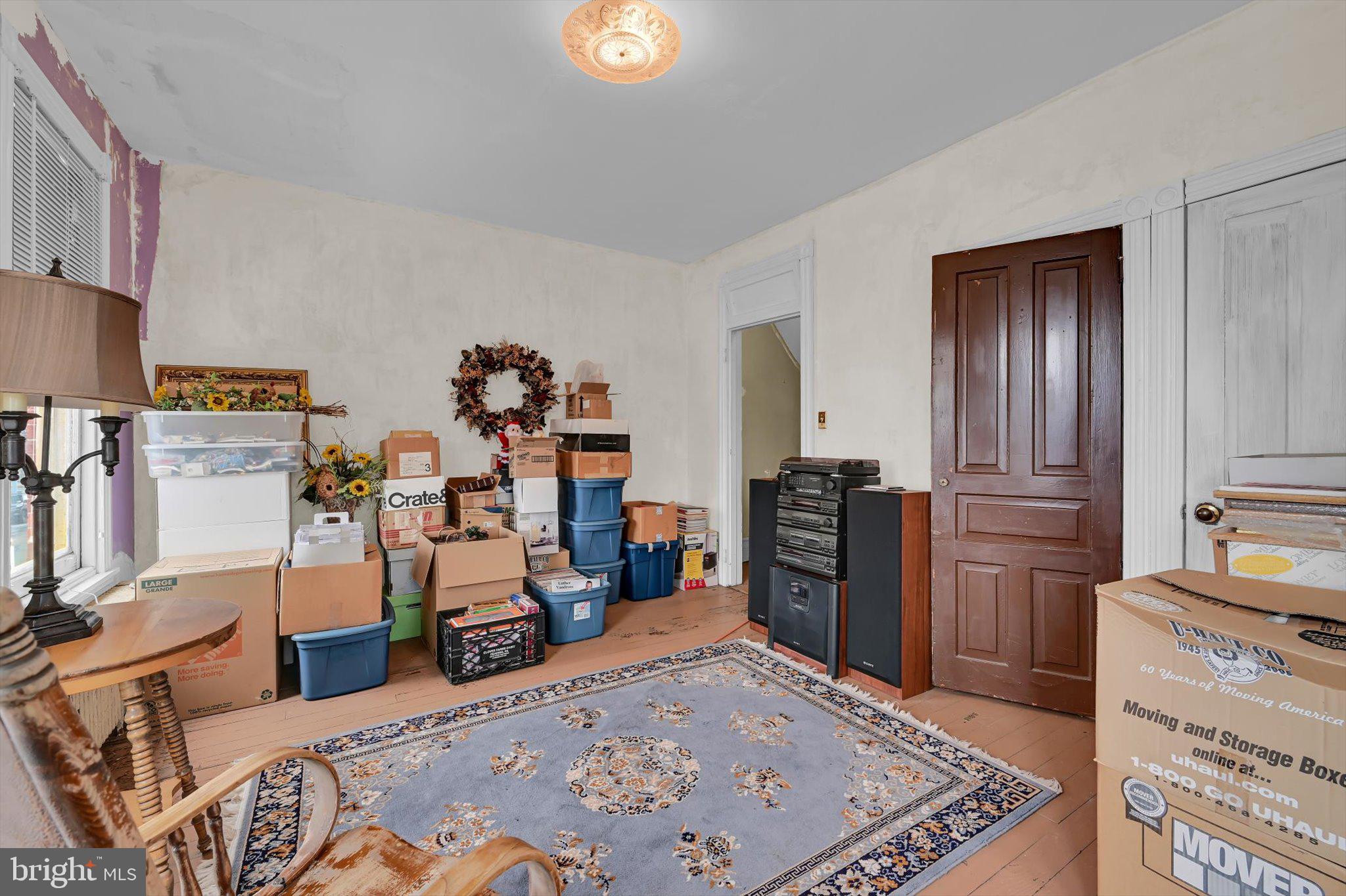 529 Windsor Street Reading, PA 19601 - Photo 27 of 36 a bed room with a bed and furniture