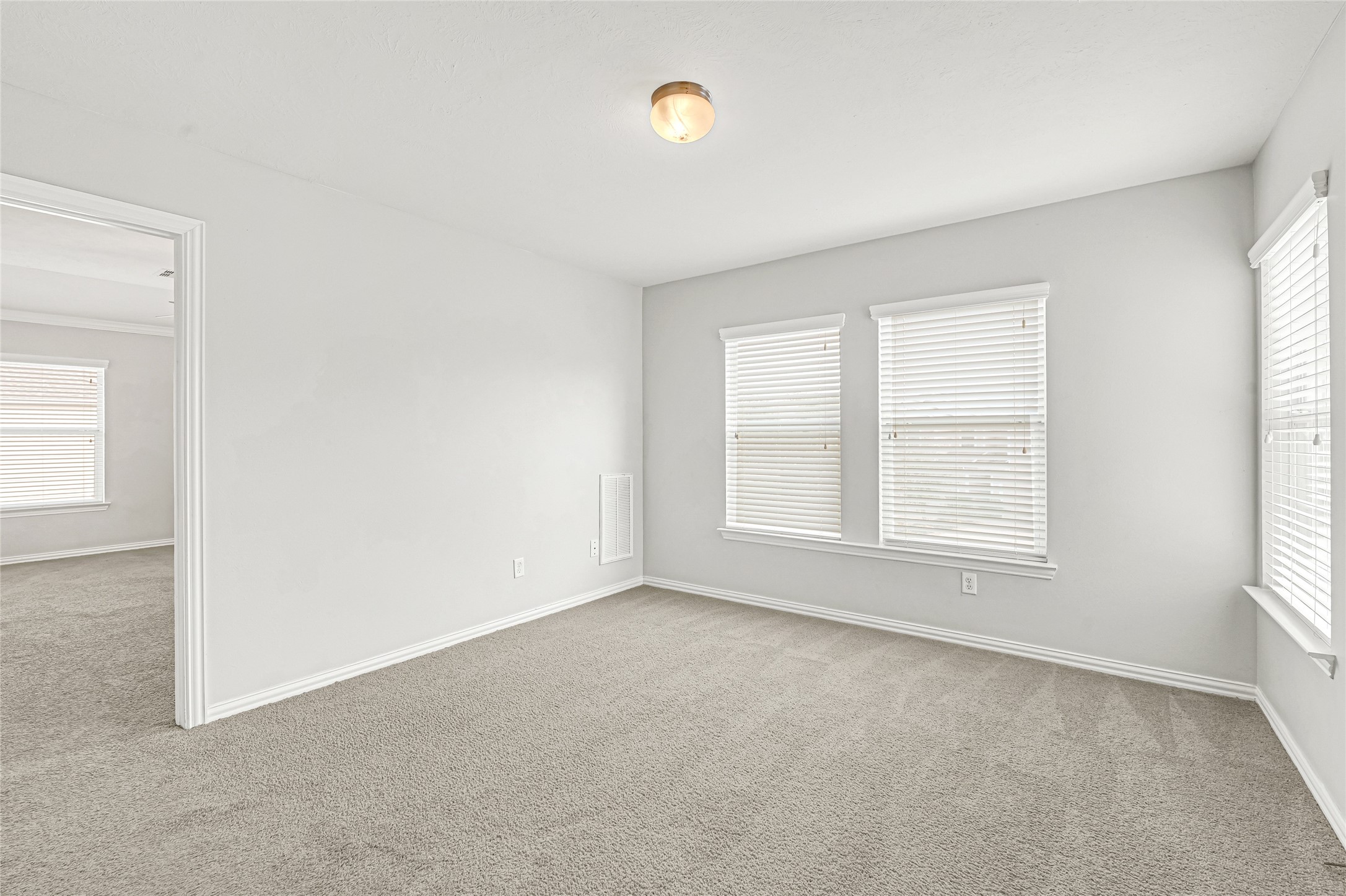 5010 Dartmoor Ridge Trail Houston, TX 77066 - Photo 25 of 28 an empty room with windows