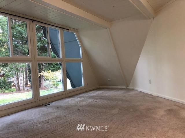 341 East Canyon View Road Belfair, WA 98528 - Photo 14 of 19 a view of an empty room with a window