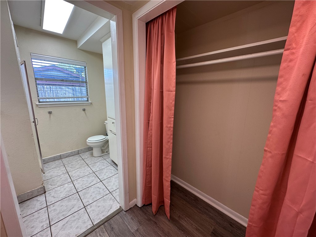 104 Frio Drive Portland, TX 78374 - Photo 21 of 37 a bathroom with a sink and a toilet