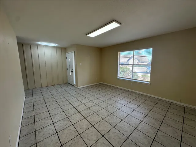 an empty room with windows