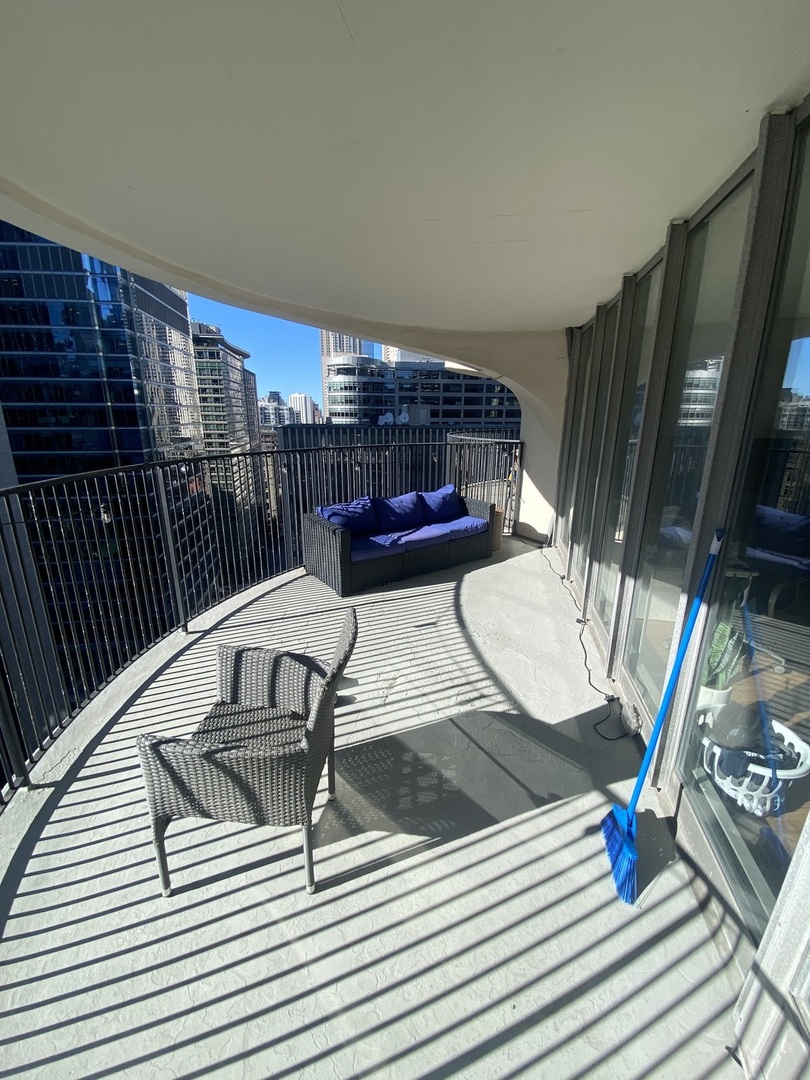 300 North State Street, Unit 2103 Chicago, IL 60654 - Photo 11 of 26 a view of balcony and deck