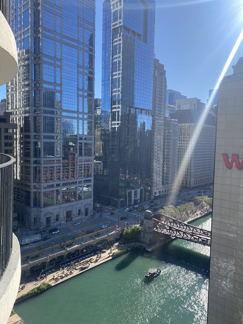 300 North State Street, Unit 2103 Chicago, IL 60654 - Photo 14 of 26 a bathroom with a shower and a sink