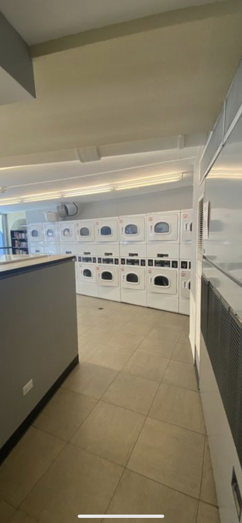 300 North State Street, Unit 2103 Chicago, IL 60654 - Photo 20 of 26 a kitchen with stainless steel appliances a cabinets and a stove top oven