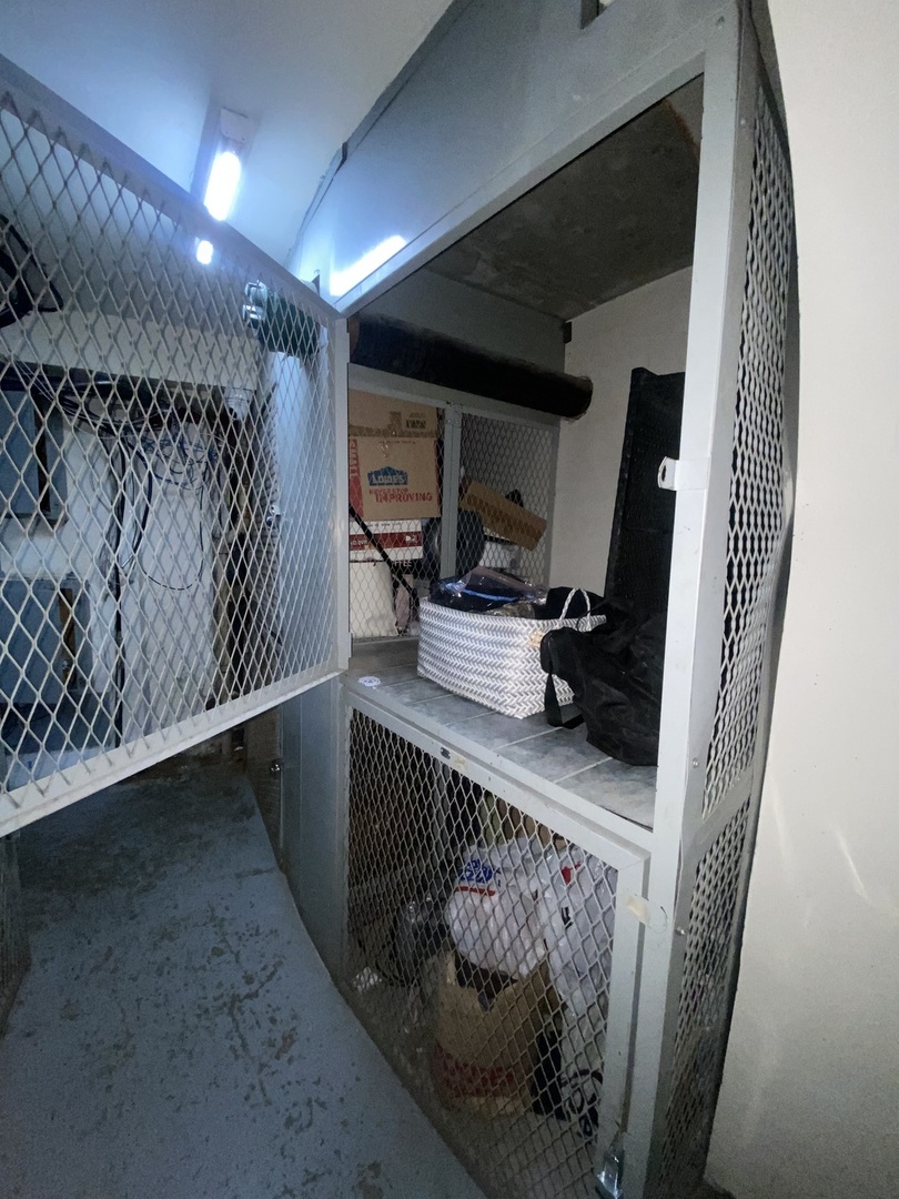 300 North State Street, Unit 2103 Chicago, IL 60654 - Photo 24 of 26 a room with storage and utility