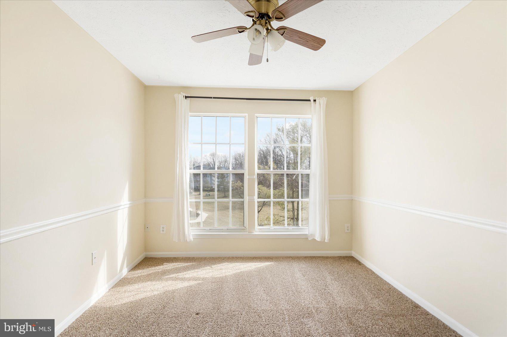 4260 Maple Path Circle, Unit 15 Nottingham, MD 21236 - Photo 20 of 35 a view of an empty room with a window