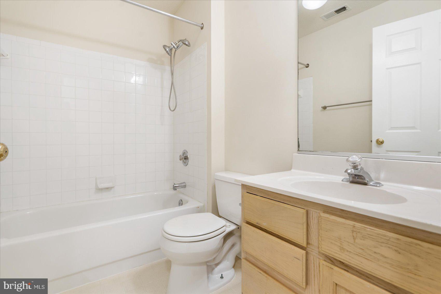 4260 Maple Path Circle, Unit 15 Nottingham, MD 21236 - Photo 24 of 35 a bathroom with a sink a toilet and shower
