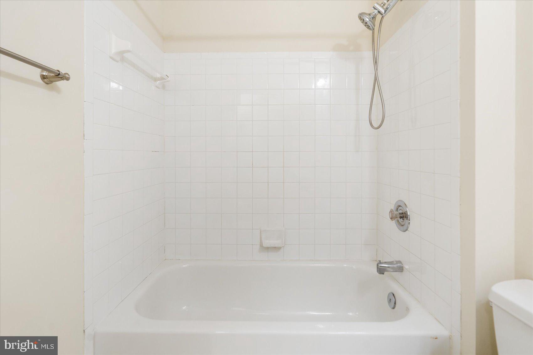 4260 Maple Path Circle, Unit 15 Nottingham, MD 21236 - Photo 25 of 35 a close up of a bathtub in a bathroom
