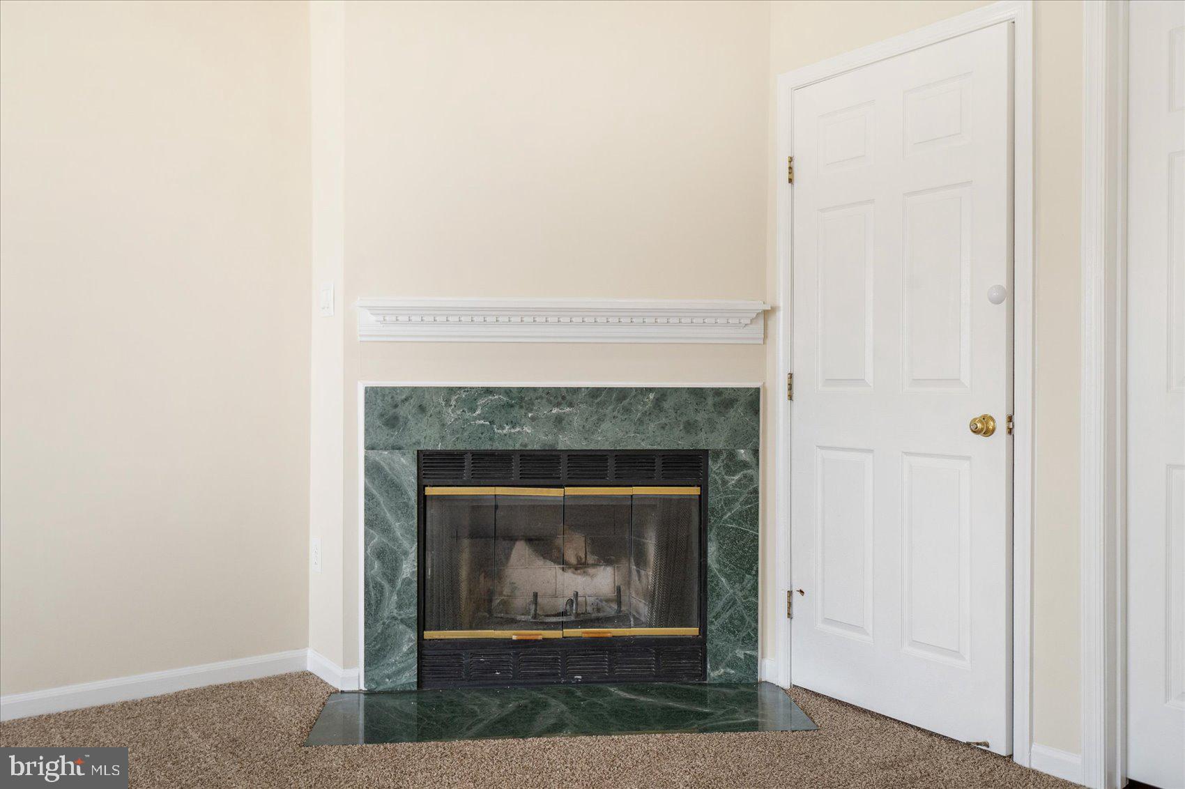 4260 Maple Path Circle, Unit 15 Nottingham, MD 21236 - Photo 29 of 35 a living room with a fireplace