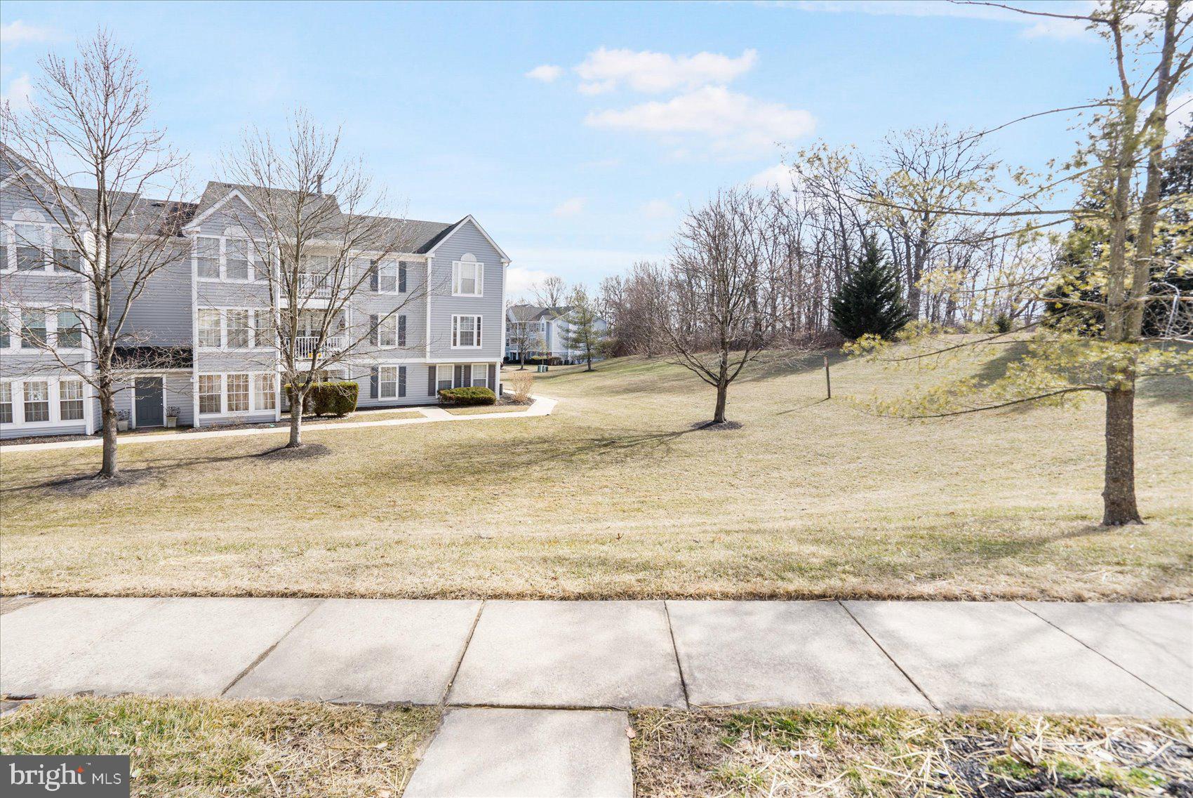 4260 Maple Path Circle, Unit 15 Nottingham, MD 21236 - Photo 34 of 35 a view of white house with snow on the road
