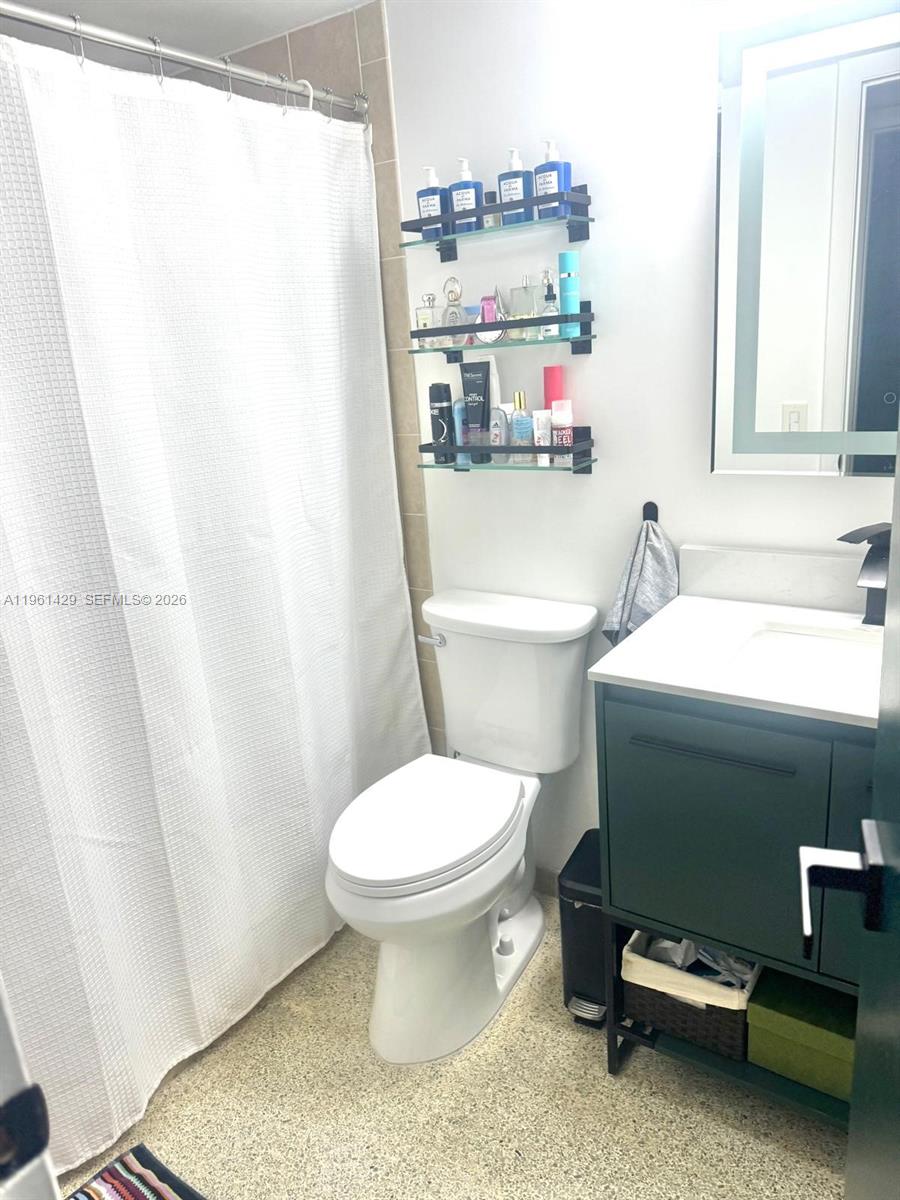 755 Southwest 6th Street, Unit 6 Miami, FL 33130 - Photo 18 of 20 a bathroom with a sink and a toilet