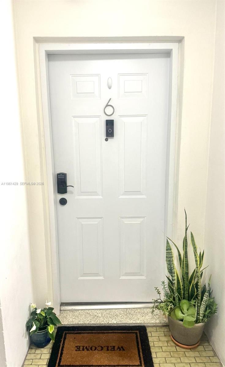 755 Southwest 6th Street, Unit 6 Miami, FL 33130 - Photo 2 of 20 a view of small space with wooden floor