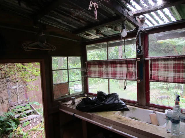 a sink sitting next to a window