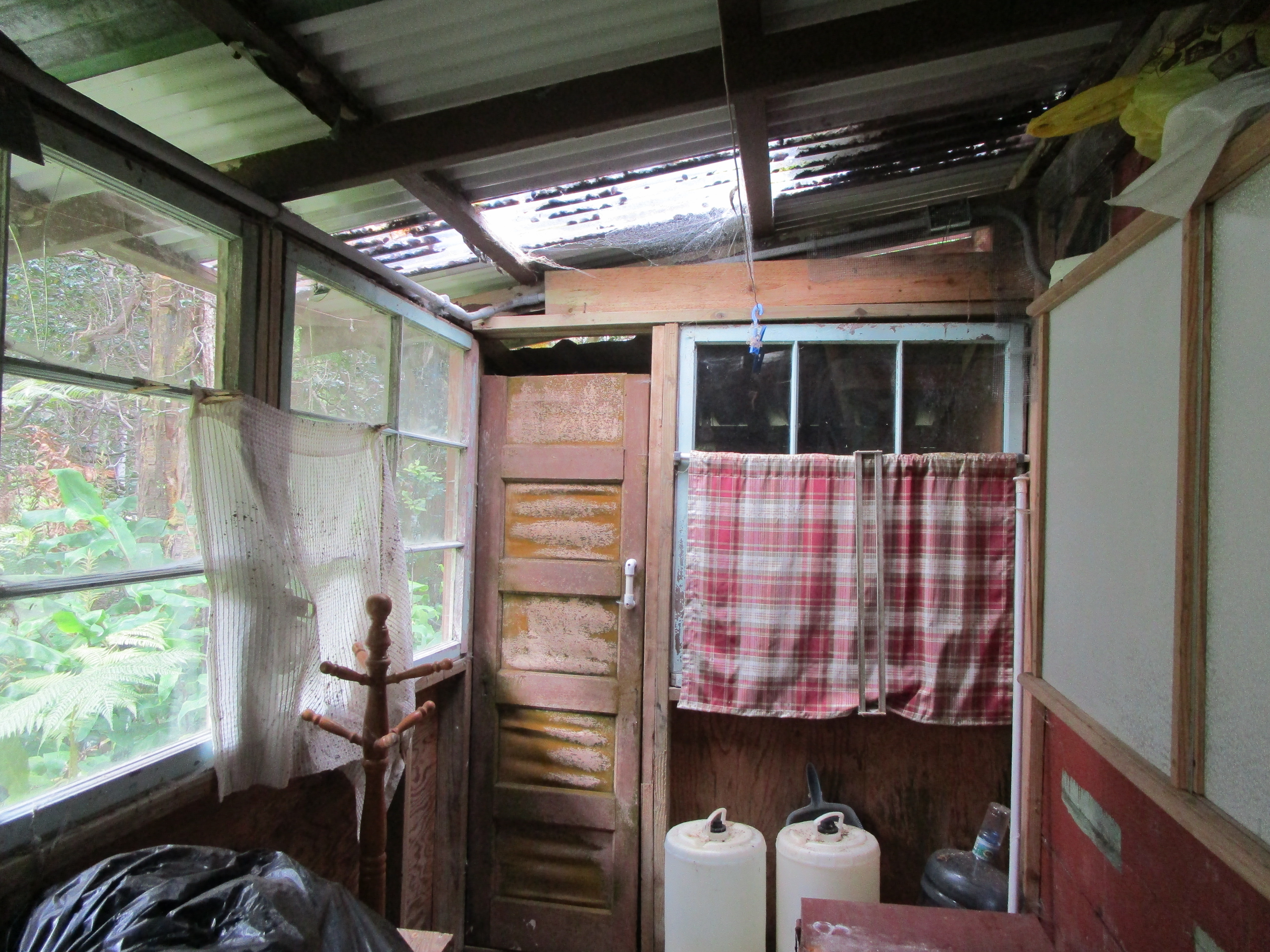 1 Alanui Iiwi Volcano, HI 96785 - Photo 6 of 22 a view of walk in closet with clothes and shoes